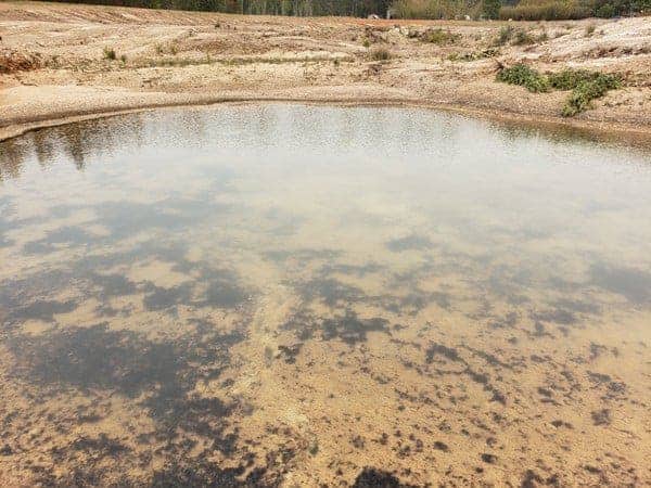 Big Ditch Dam Builder Empty dam built on rock base