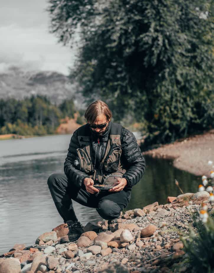 Big Ditch Dam Builder man inspecting dam