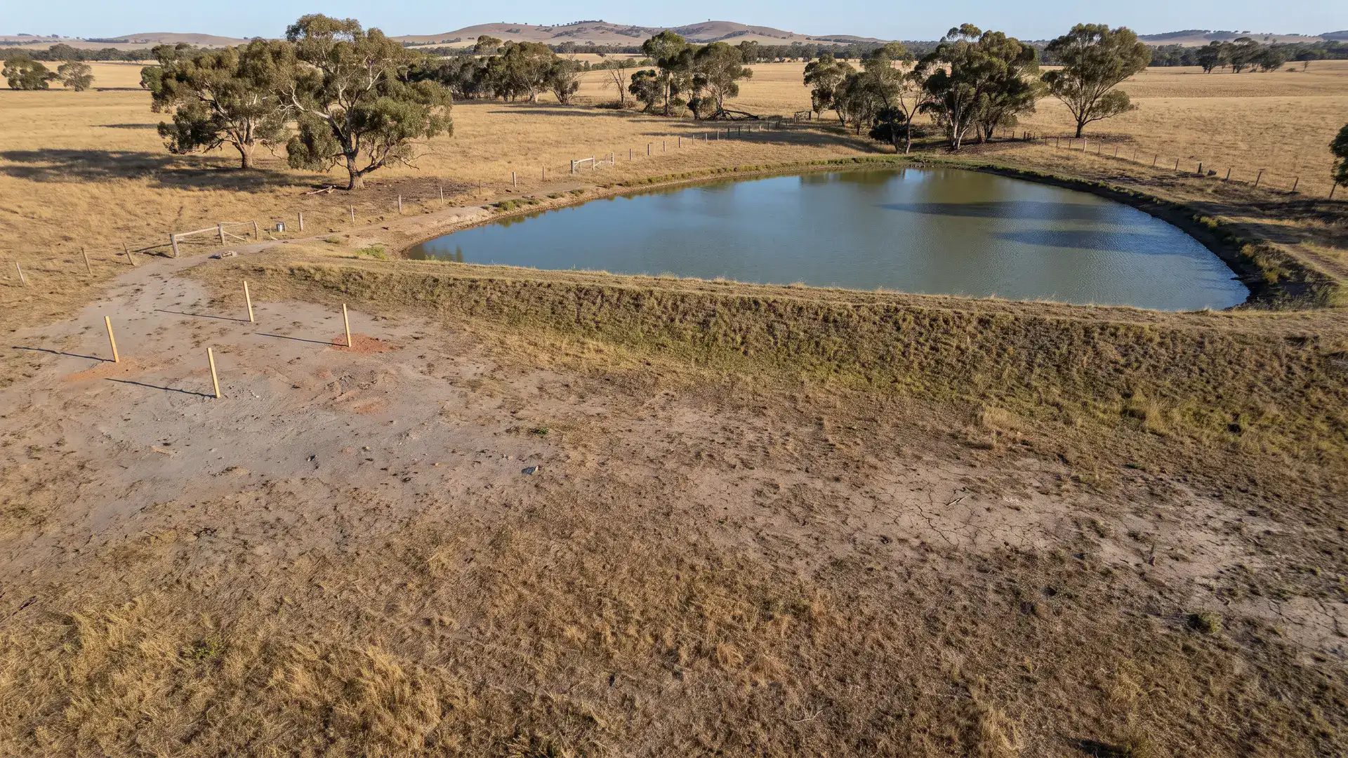 Rural dam and survey stakes for farm dam permit South Australia site planning