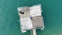 Floating dock construction by Big Ditch Dam Building Company, custom marine structure installation.